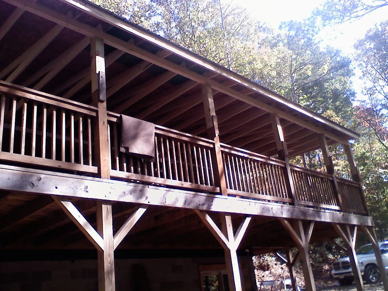 Timber framing under a new elevated porch and deck — Roof Leak Repair in Falls by Roofing Brothers
